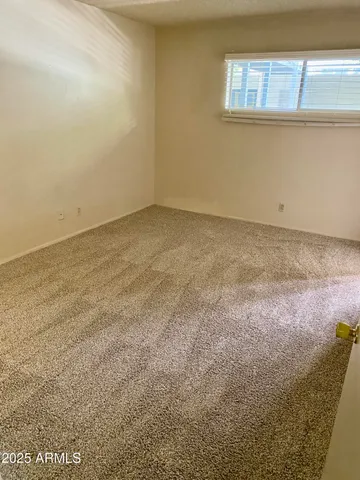 a view of a room that has a window