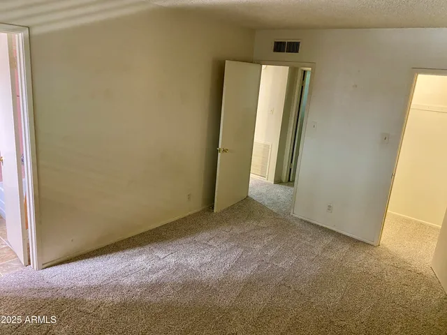 an empty room with closet