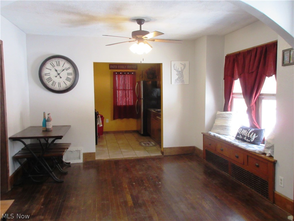415 Randolph Road Mogadore, OH 44260 - Photo 4 of 30 Rustic living room with natural hardwood floors, built in window seat.