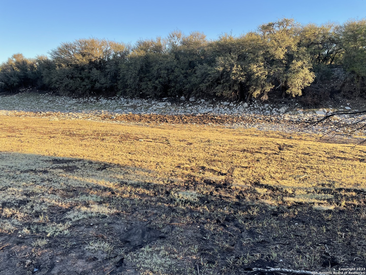 587 Valley Road Christoval, TX 76935 - Photo 18 of 41 a view of a yard with a house