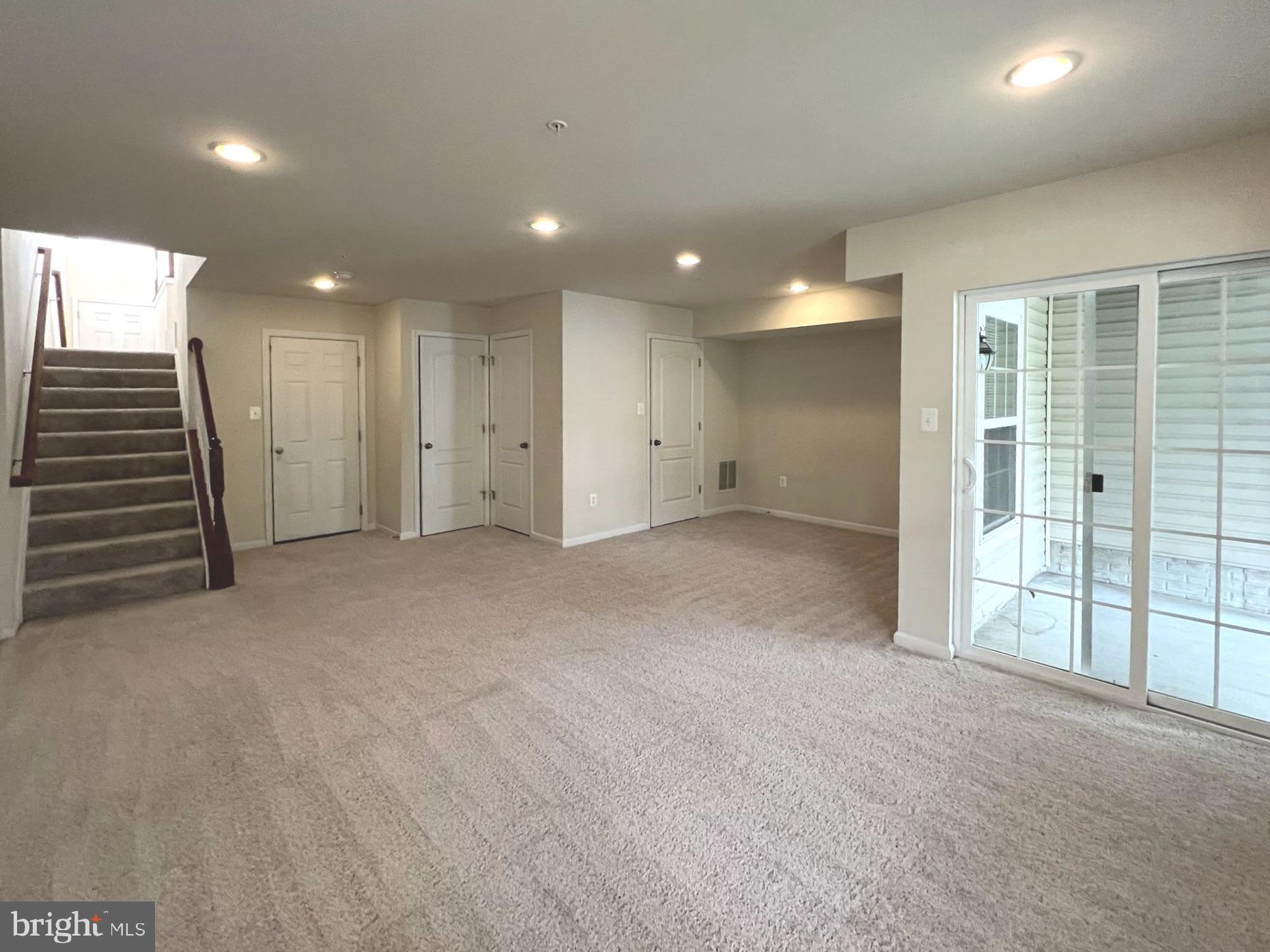 1009 Red Clover Road Gambrills, MD 21054 - Photo 17 of 21 an empty room with large windows