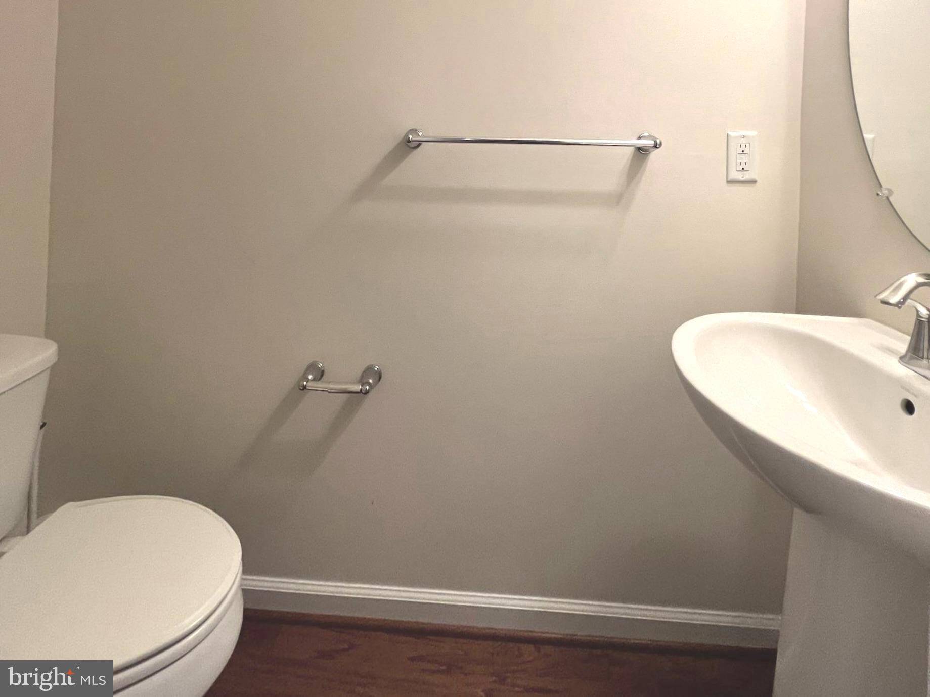 1009 Red Clover Road Gambrills, MD 21054 - Photo 18 of 21 a bathroom with a toilet and a sink