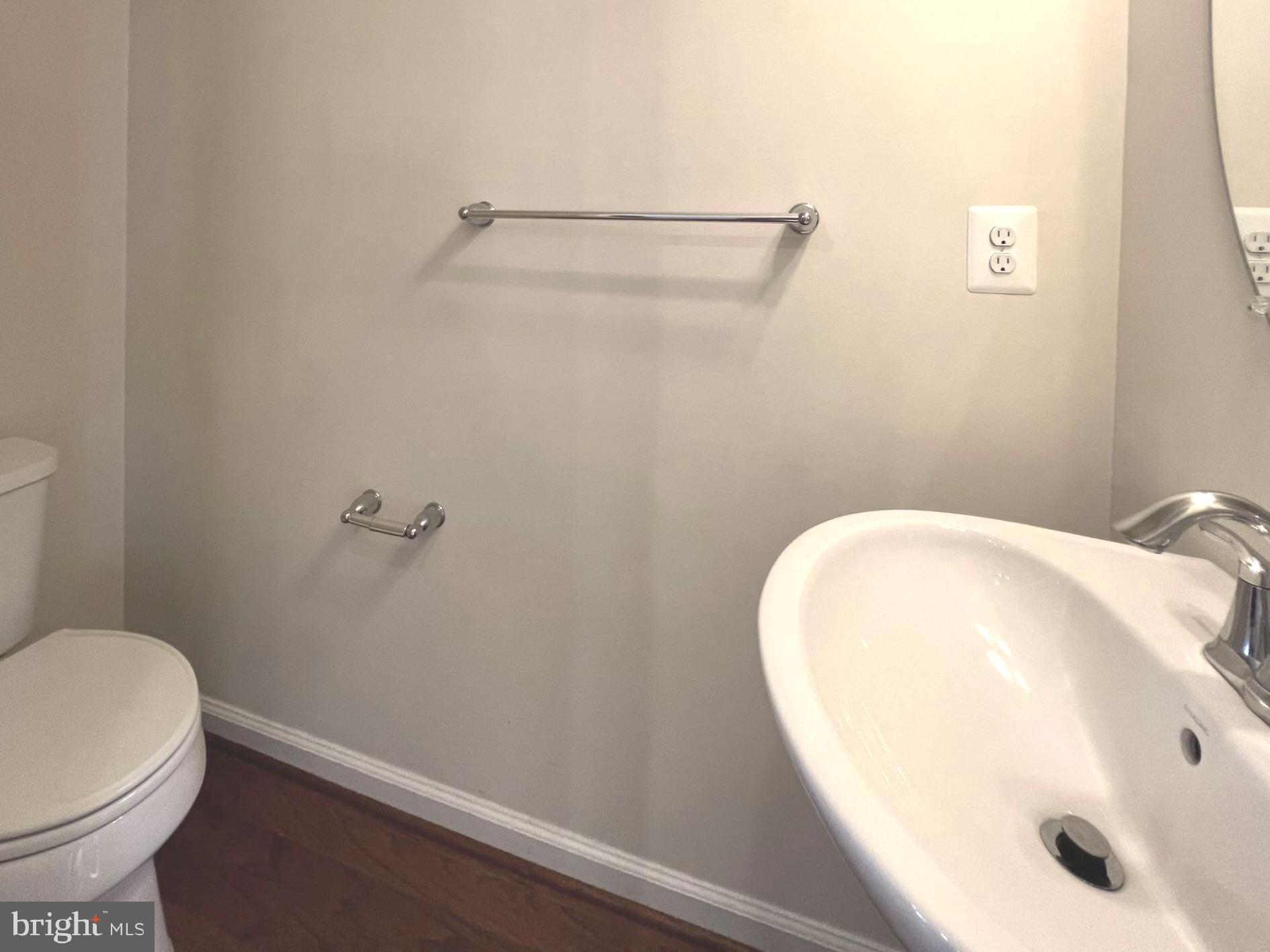 1009 Red Clover Road Gambrills, MD 21054 - Photo 7 of 21 a bathroom with a sink and toilet