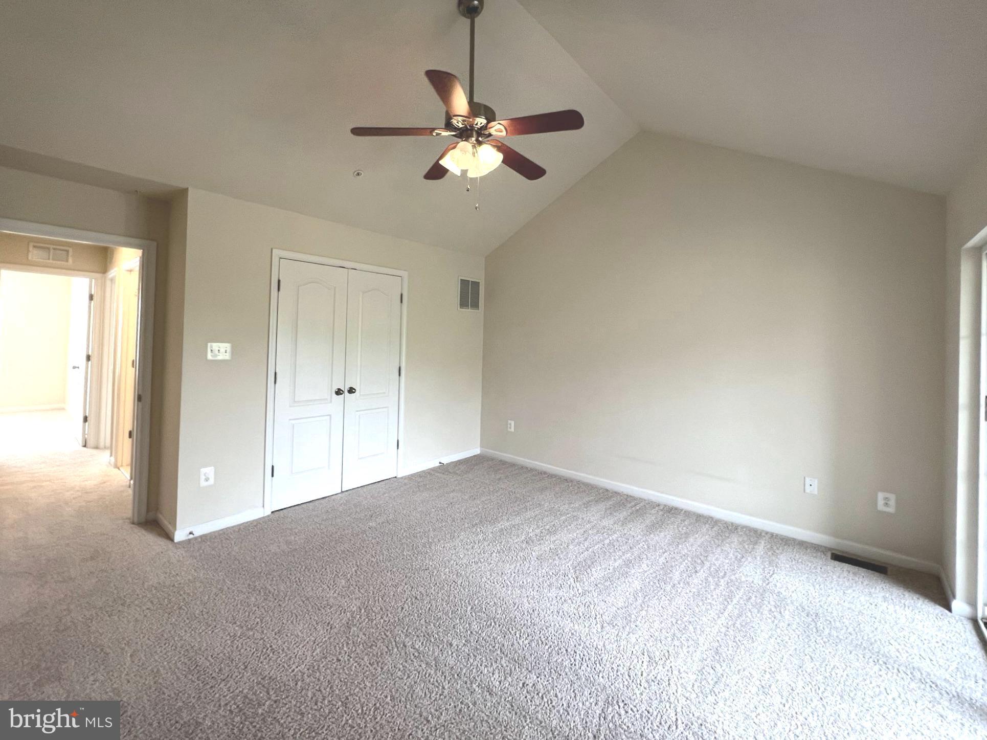 1009 Red Clover Road Gambrills, MD 21054 - Photo 9 of 21 a view of an empty room and chandelier fan