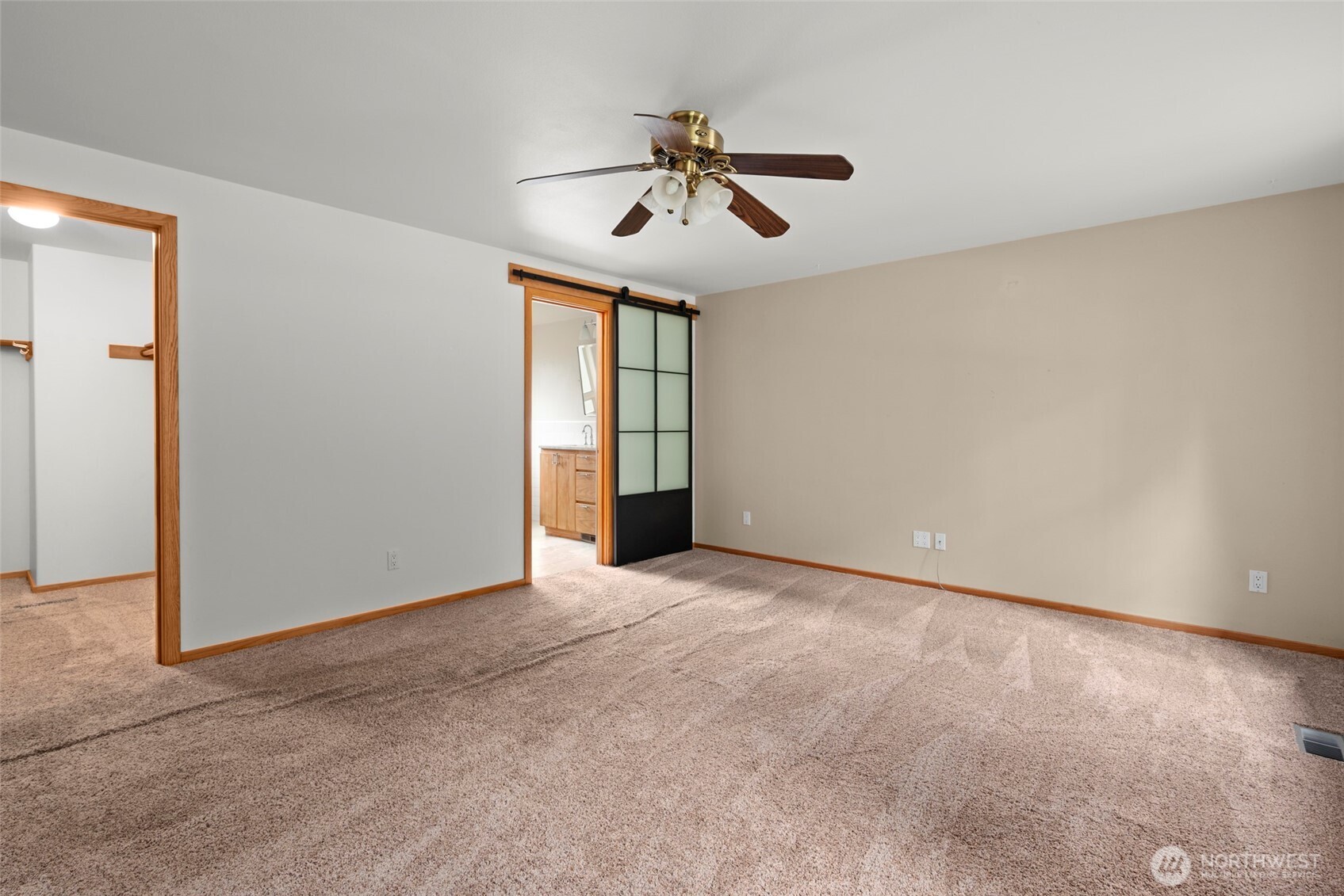 2049 Zylstra Road Oak Harbor, WA 98277 - Photo 16 of 36 an empty room with chandelier fan and windows