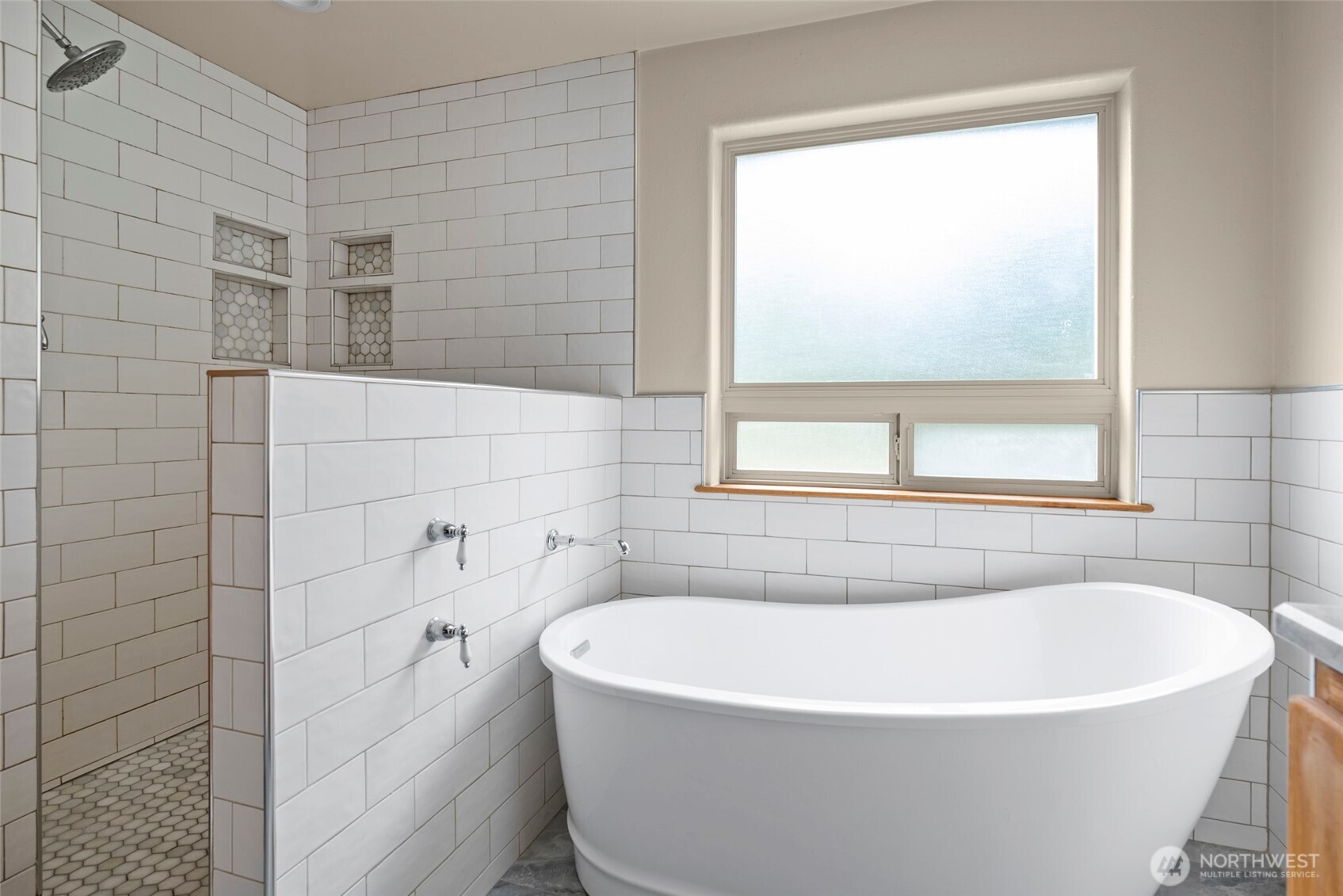 2049 Zylstra Road Oak Harbor, WA 98277 - Photo 17 of 36 a white bath tub sitting in a bathroom next to a window