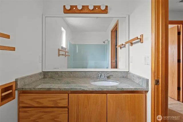 a view of a hallway with a window