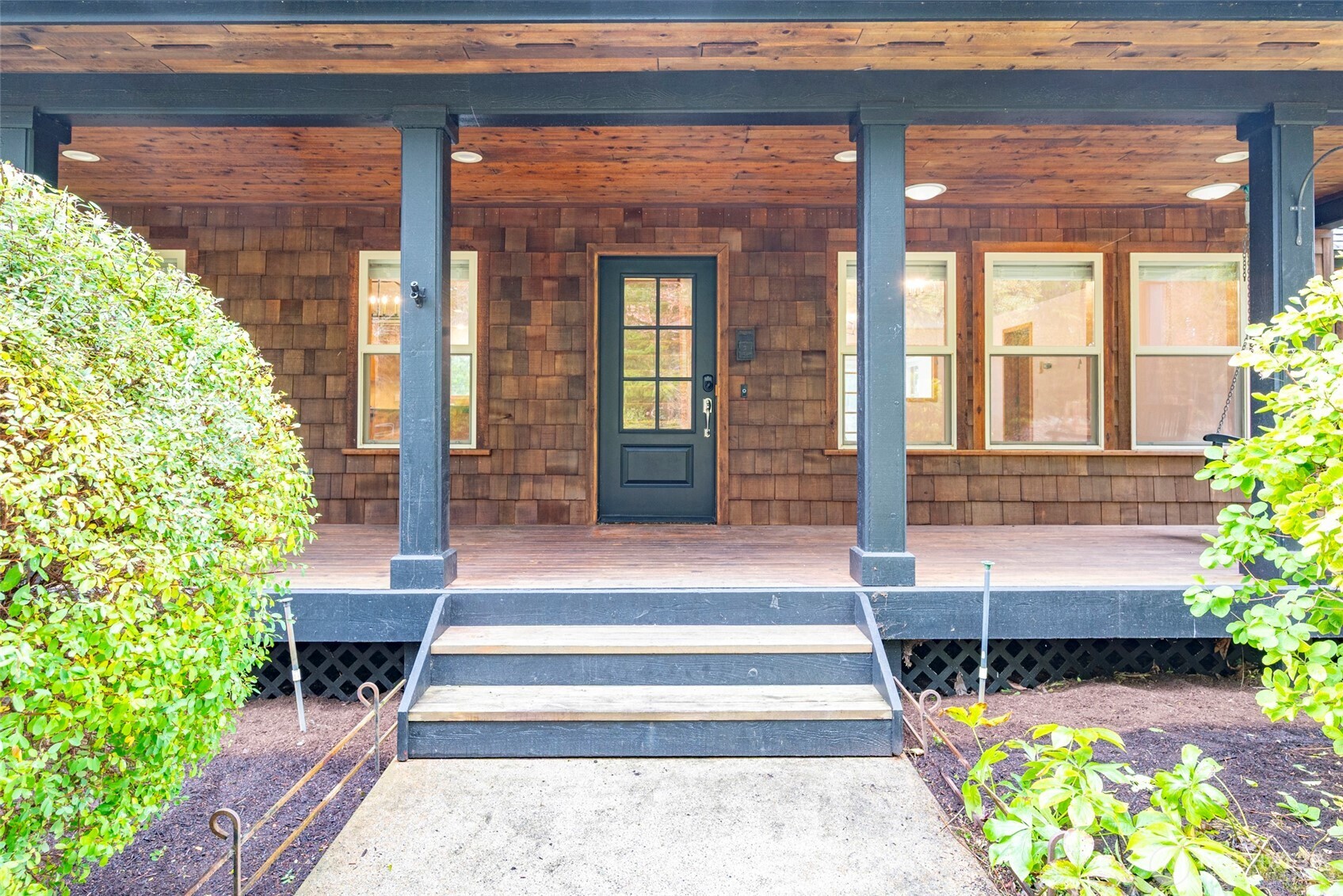 2049 Zylstra Road Oak Harbor, WA 98277 - Photo 3 of 36 a front view of a house with garden