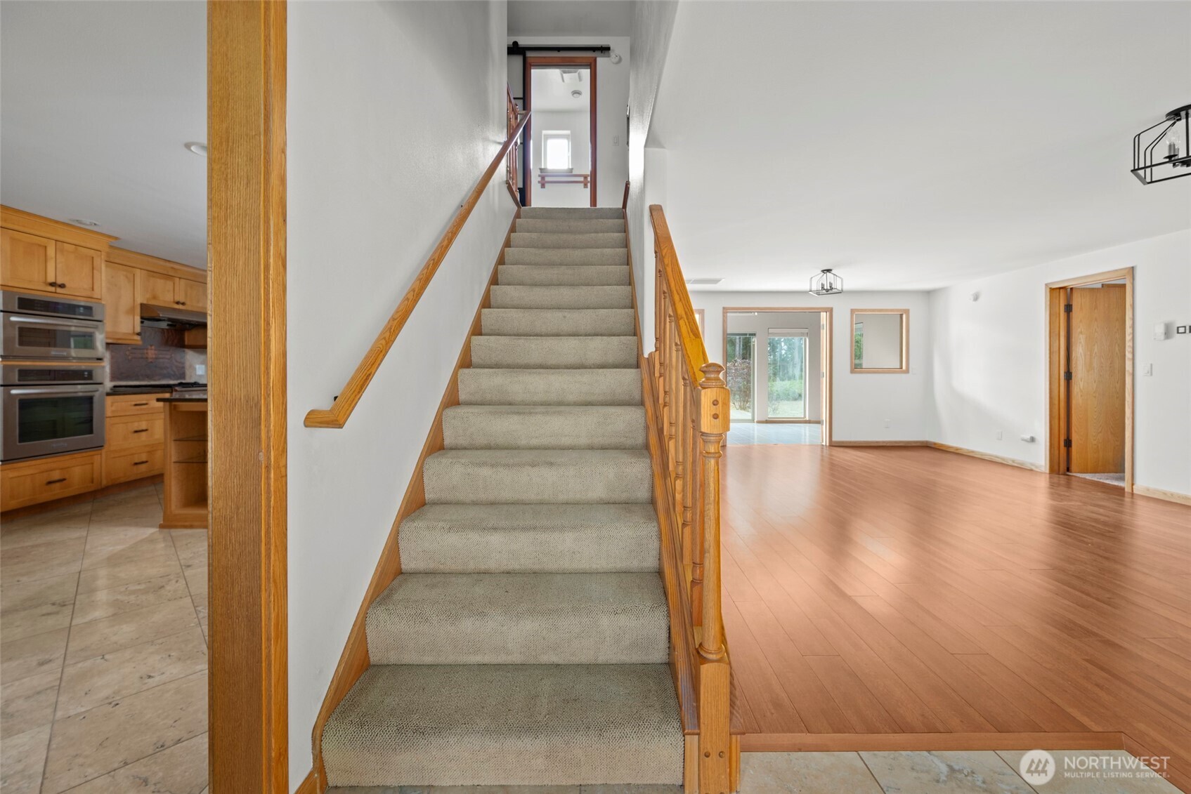 2049 Zylstra Road Oak Harbor, WA 98277 - Photo 5 of 36 a view of entryway and hall with wooden floor