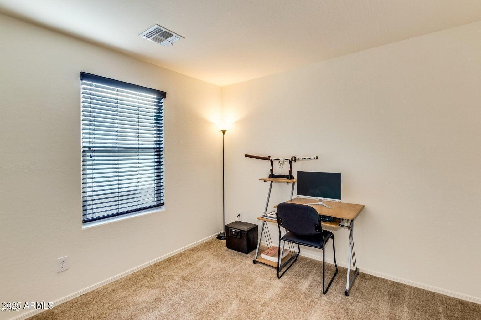 12057 West Rowel Road Peoria, AZ 85383 - Photo 10 of 20 a view of workspace with a window