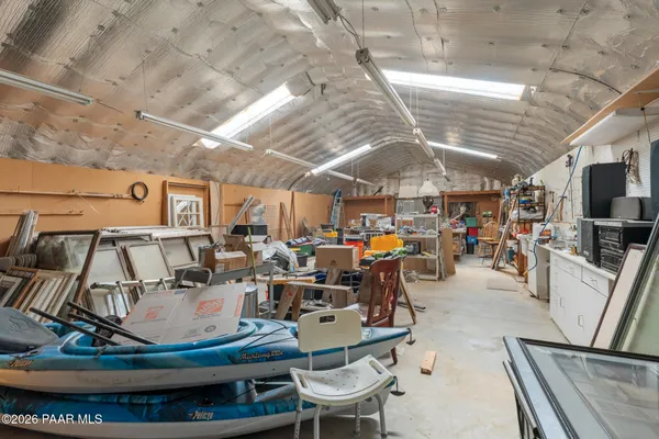 a view of a backyard with sitting area
