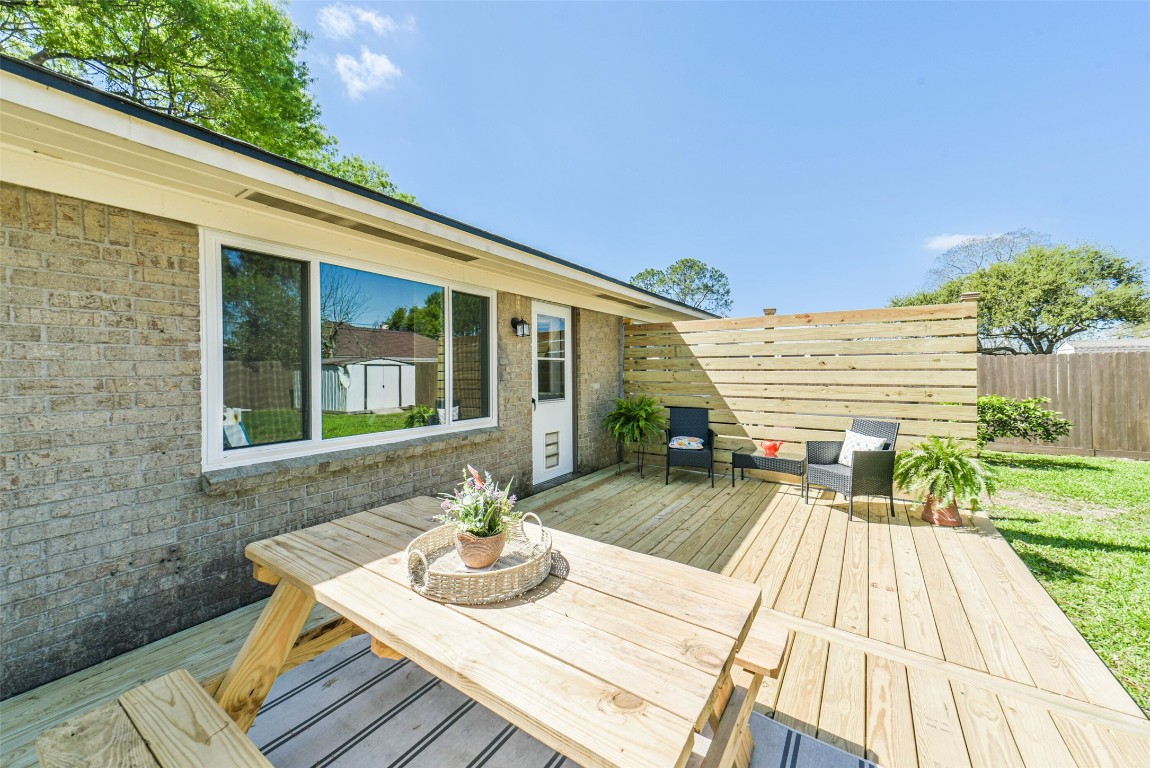 323 Coventry Lane Alvin, TX 77511 - Photo 32 of 37 swimming pool view with a outdoor seating