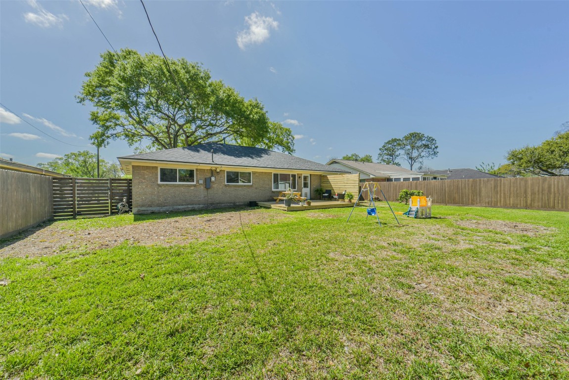 323 Coventry Lane Alvin, TX 77511 - Photo 34 of 37 a view of an house with backyard space and balcony
