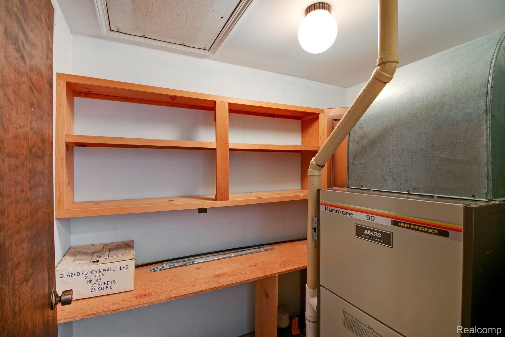 19754 Fry Road Northville, MI 48167 - Photo 30 of 35 Furnace room, attic with extra storage space