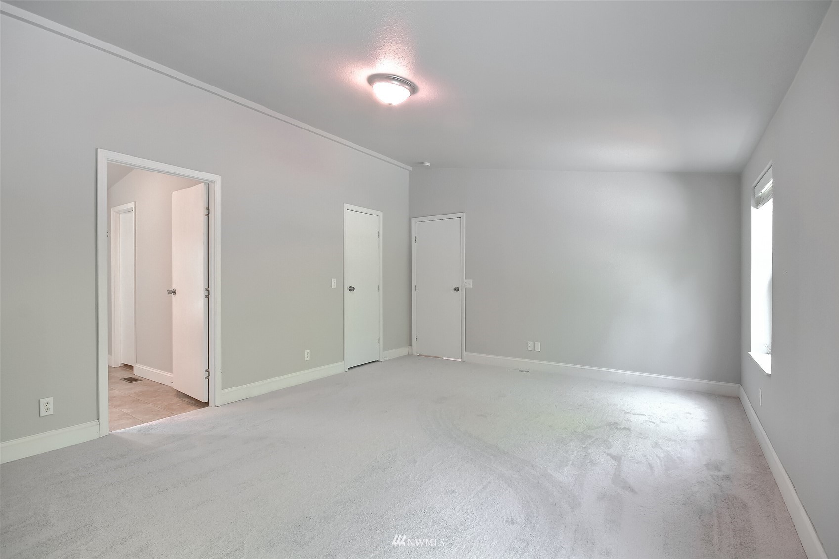 12319 Chain Lake Road Snohomish, WA 98290 - Photo 16 of 38 a view of an empty room