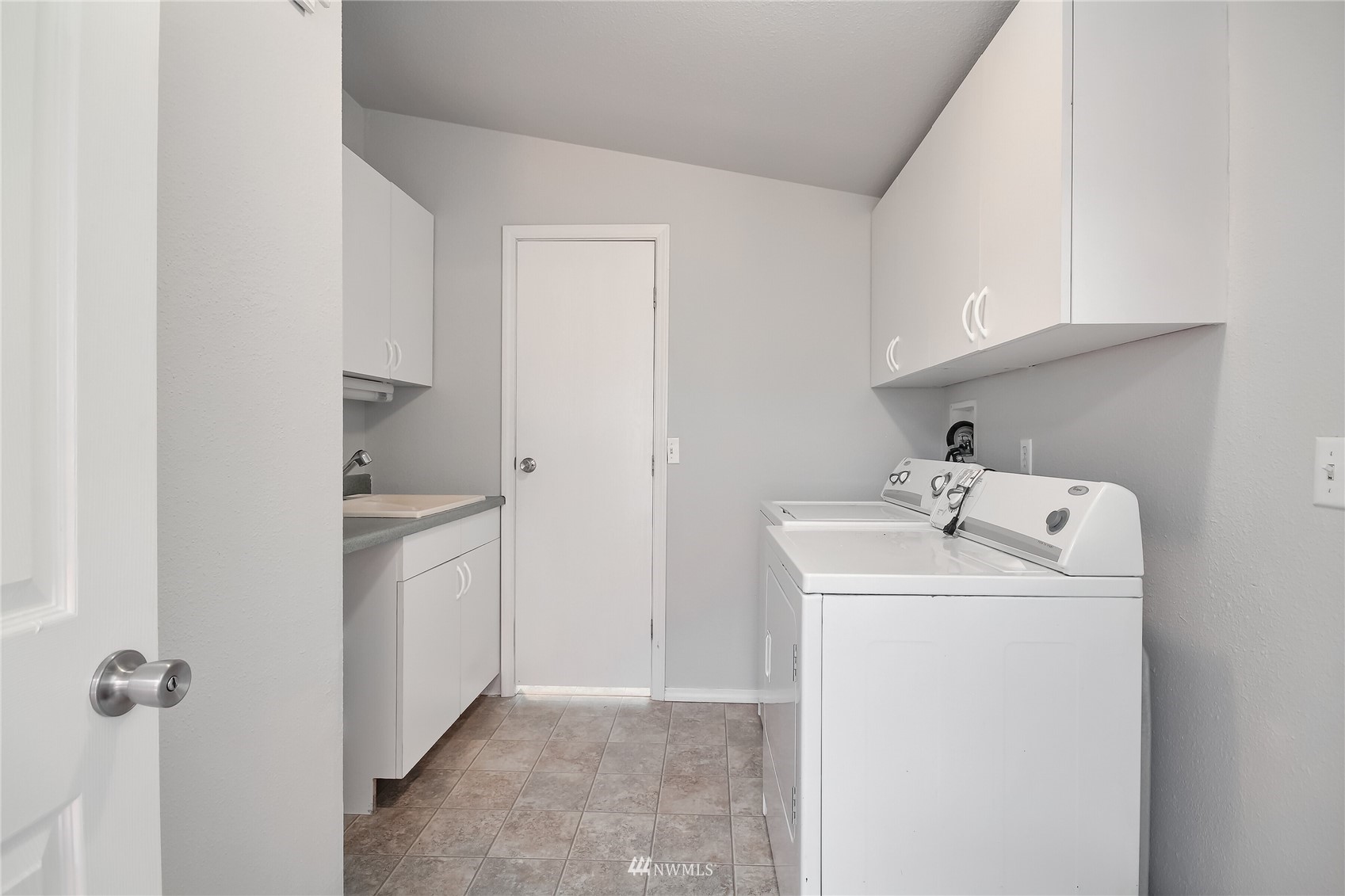 12319 Chain Lake Road Snohomish, WA 98290 - Photo 23 of 38 a utility room with dryer and washer