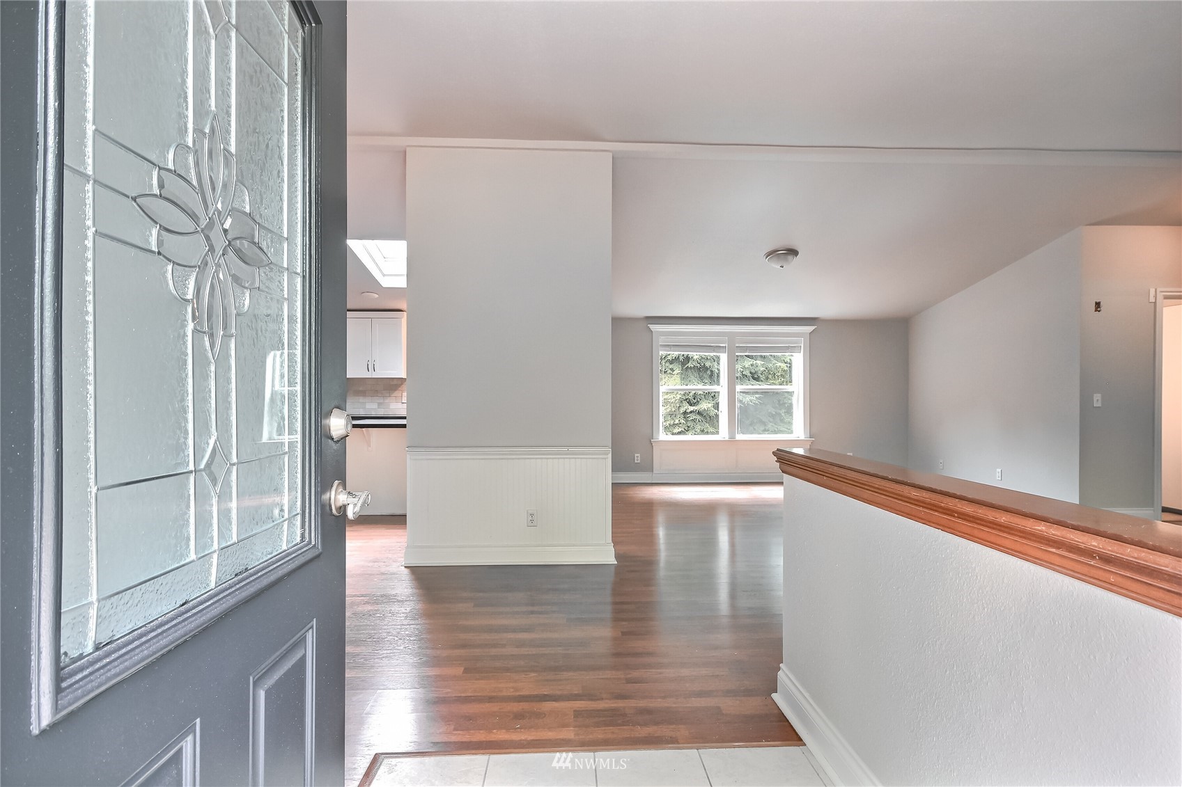 12319 Chain Lake Road Snohomish, WA 98290 - Photo 5 of 38 a view of empty room with wooden floor and fan