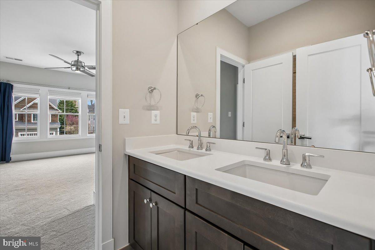 1462 Spring Vale Avenue McLean, VA 22101 - Photo 18 of 25 Elegant dual-sink bathroom retreat.