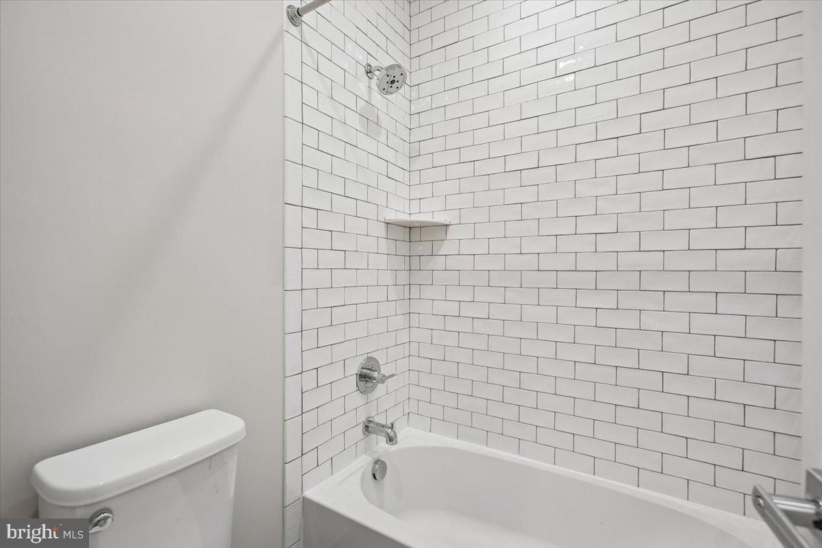 1462 Spring Vale Avenue McLean, VA 22101 - Photo 19 of 25 Sleek, modern bathroom retreat.