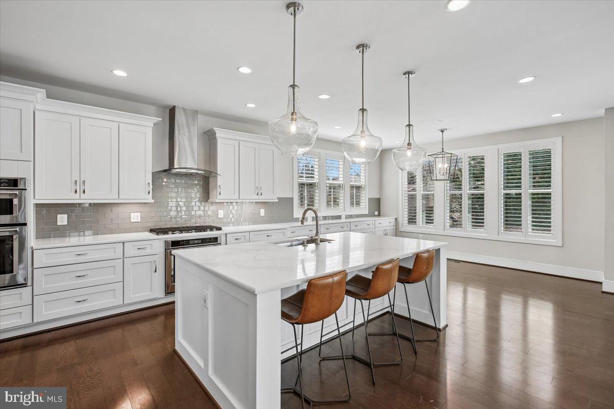 1462 Spring Vale Avenue McLean, VA 22101 - Photo 7 of 25 Modern kitchen with elegant finishes.