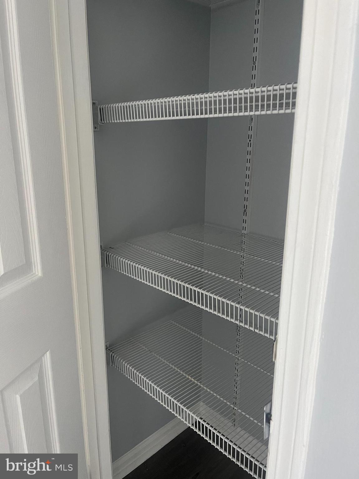 11510 Little Patuxent Parkway, Unit 407 Columbia, MD 21044 - Photo 12 of 15 a bathroom with a glass shower door