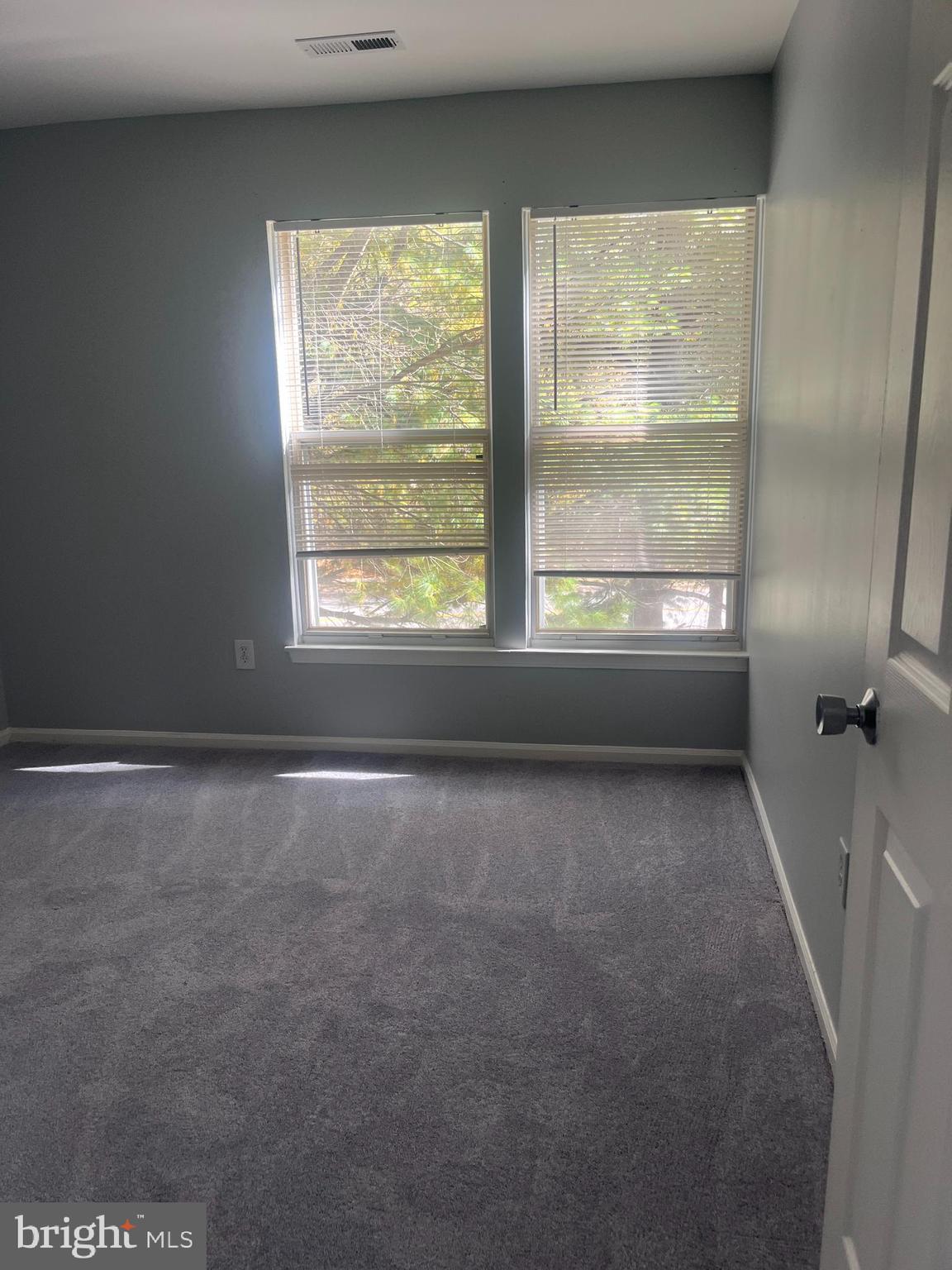 11510 Little Patuxent Parkway, Unit 407 Columbia, MD 21044 - Photo 5 of 15 an empty room with a window