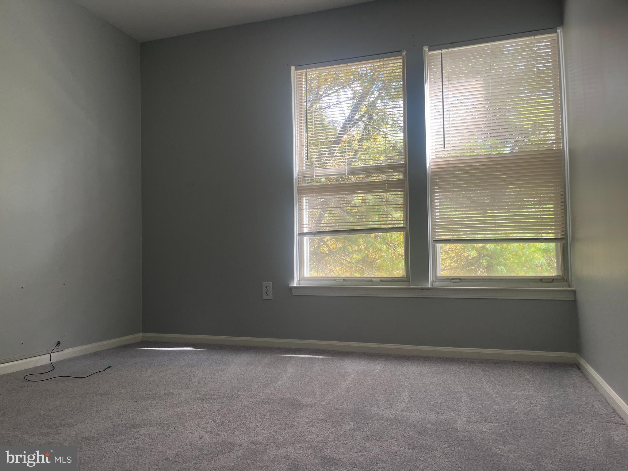 11510 Little Patuxent Parkway, Unit 407 Columbia, MD 21044 - Photo 10 of 15 an empty room with a window
