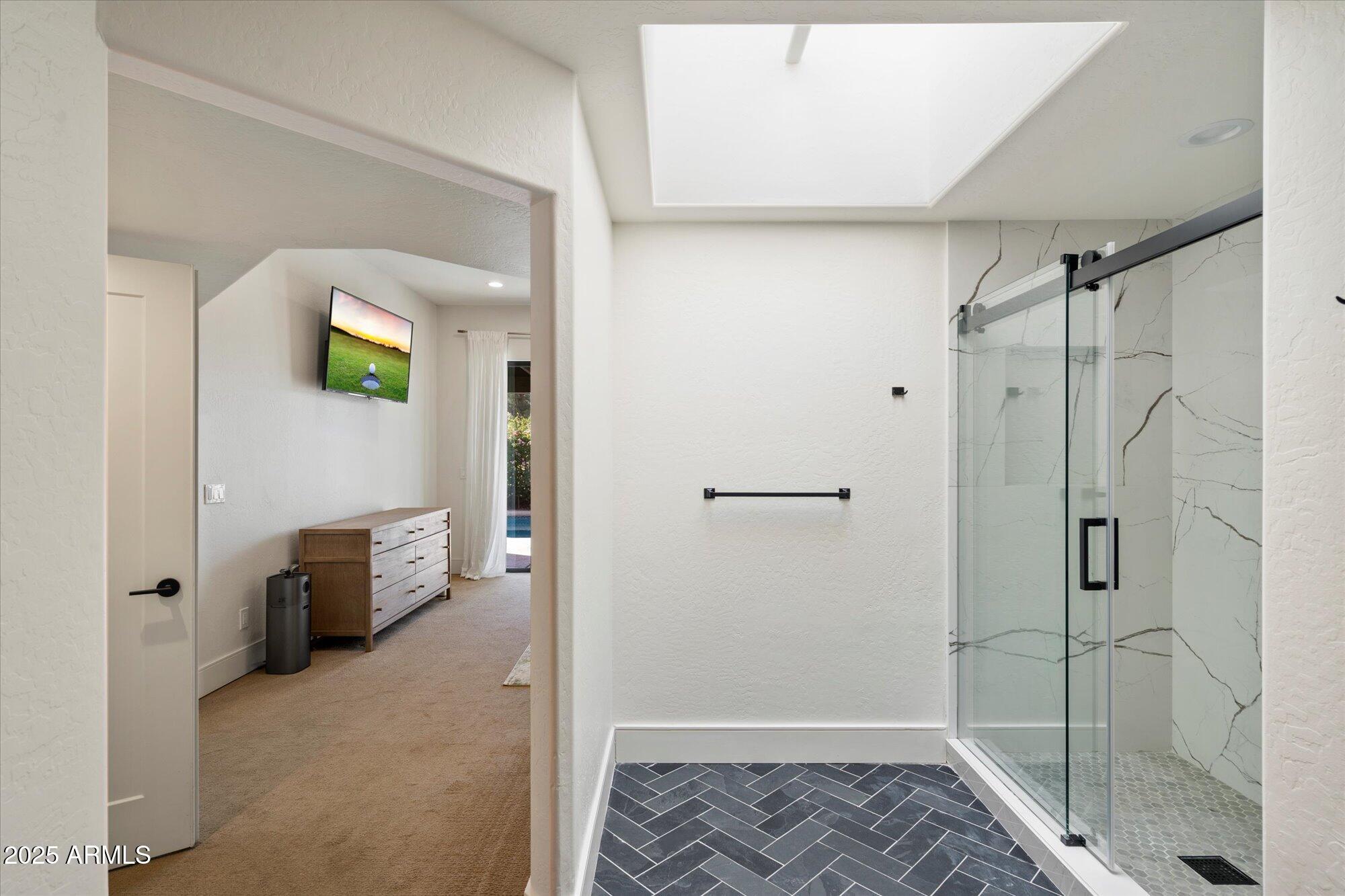 11846 North 40th Place Phoenix, AZ 85028 - Photo 17 of 37 a bathroom with a shower and a sink