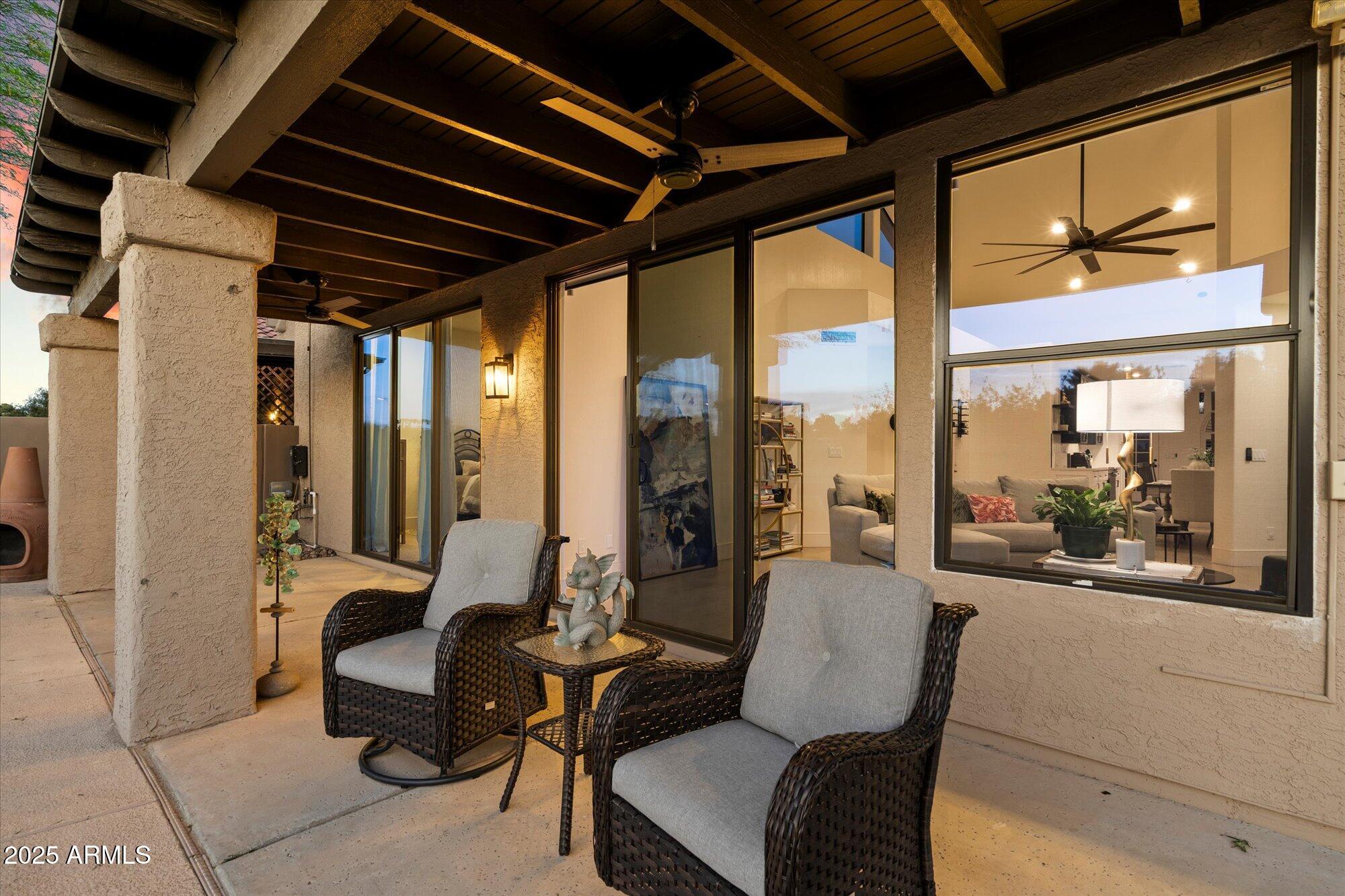 11846 North 40th Place Phoenix, AZ 85028 - Photo 25 of 37 a living room with furniture and a large window