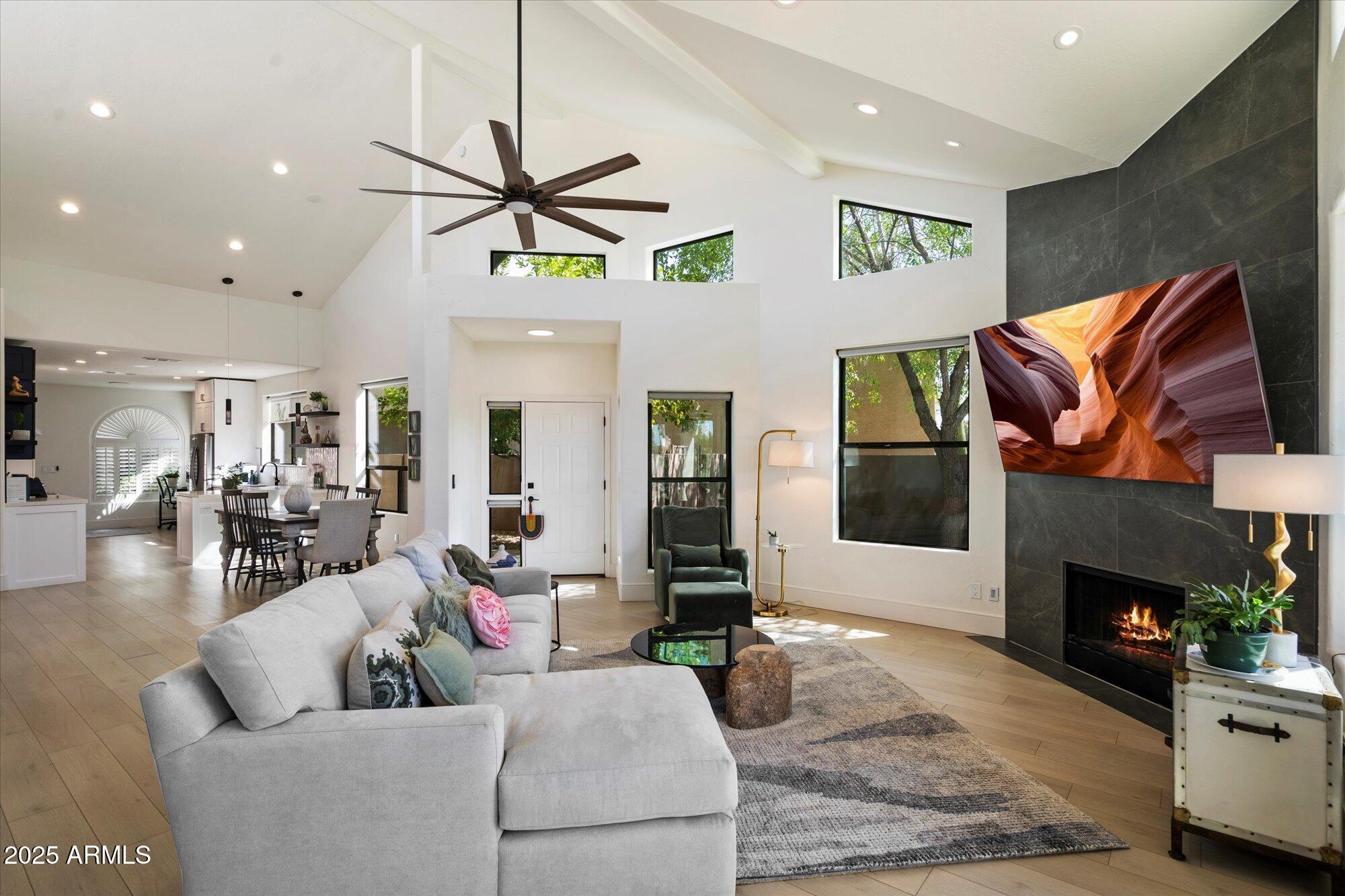 11846 North 40th Place Phoenix, AZ 85028 - Photo 3 of 37 a living room with furniture and a fireplace