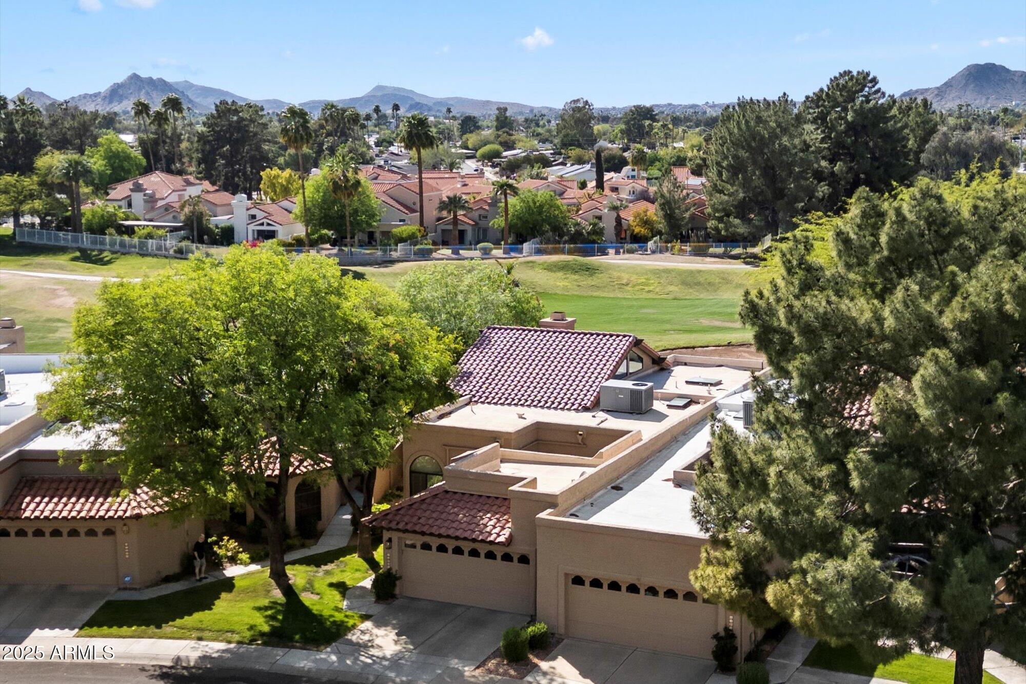 11846 North 40th Place Phoenix, AZ 85028 - Photo 32 of 37 an aerial view of a house with garden space and street view