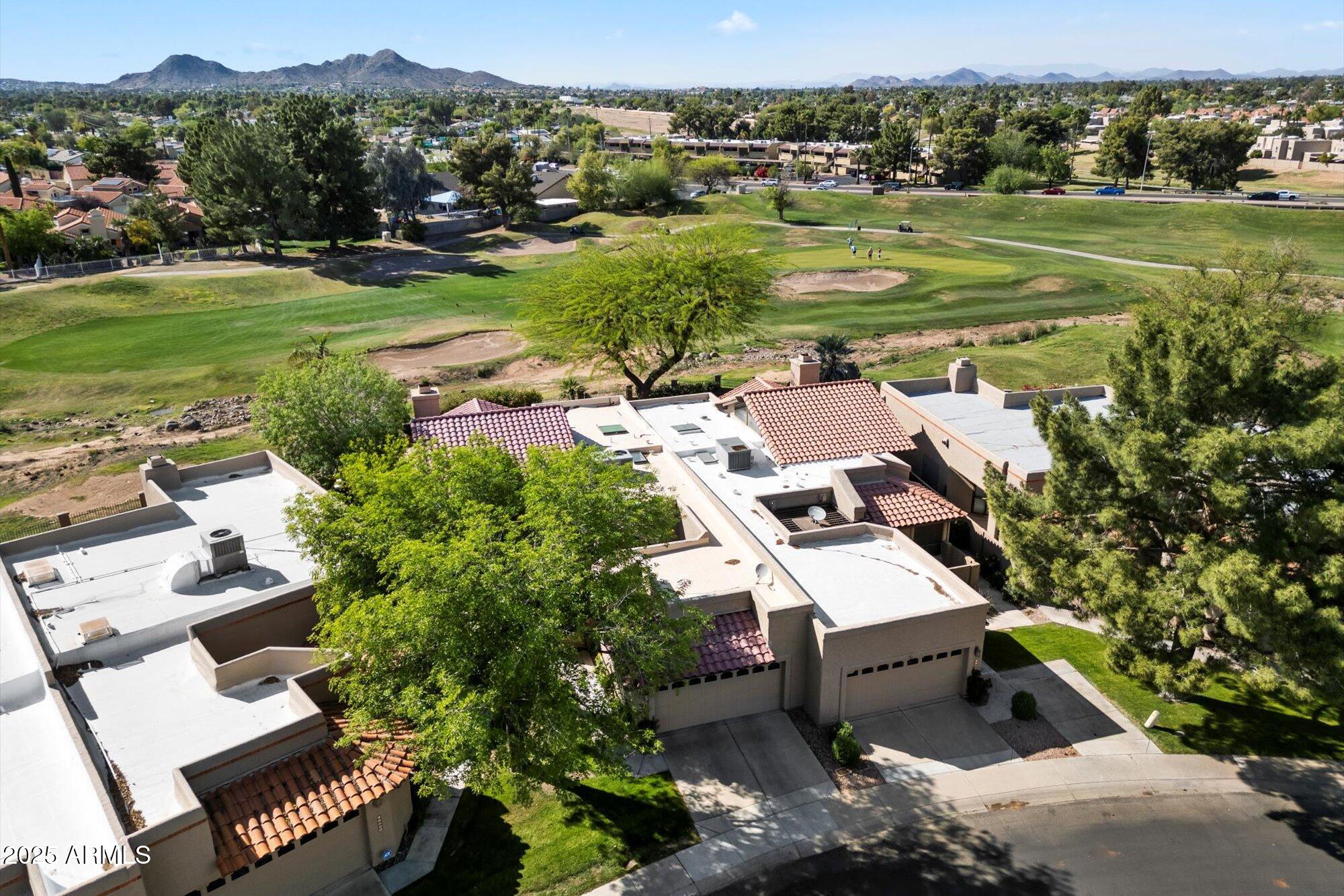 11846 North 40th Place Phoenix, AZ 85028 - Photo 33 of 37 an aerial view of a house with a yard