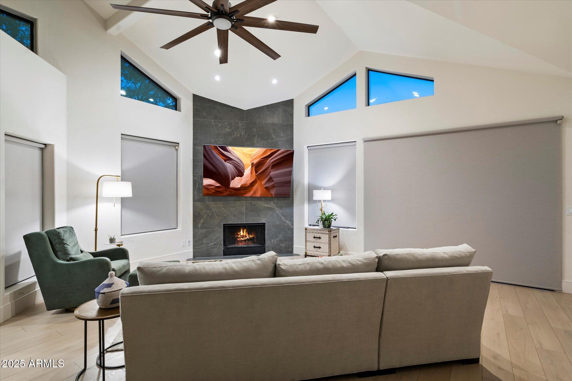 11846 North 40th Place Phoenix, AZ 85028 - Photo 5 of 37 a living room with furniture and a fireplace