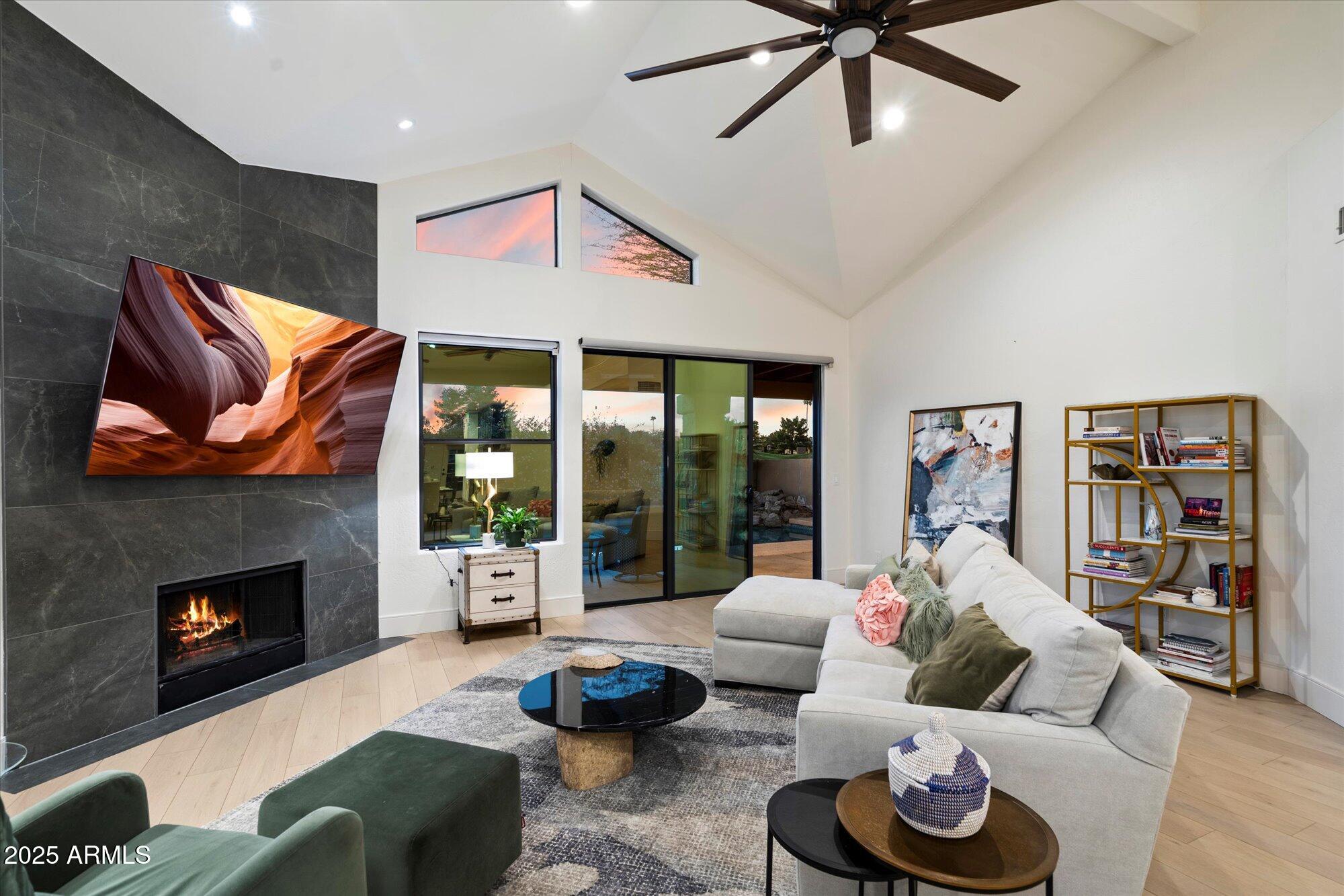 11846 North 40th Place Phoenix, AZ 85028 - Photo 6 of 37 a living room with furniture and a fireplace