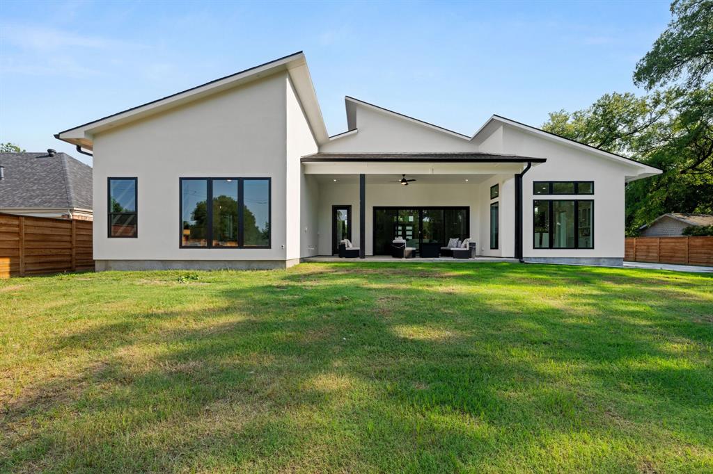 3115 Gibbs Williams Road Dallas, TX 75233 - Photo 27 of 29 a view of a house with a yard and porch