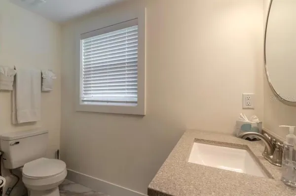 a bathroom with a sink and a toilet
