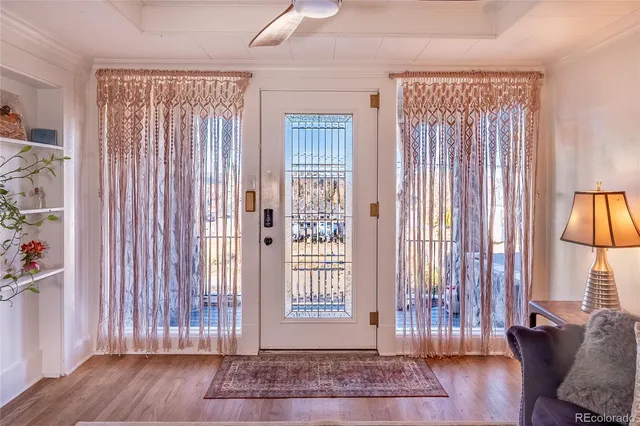 a view of a livingroom with furniture and wooden floor
