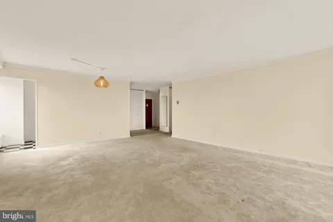 a view of an empty room and window