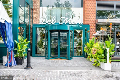 a view of outdoor space with seating area and outdoor seating