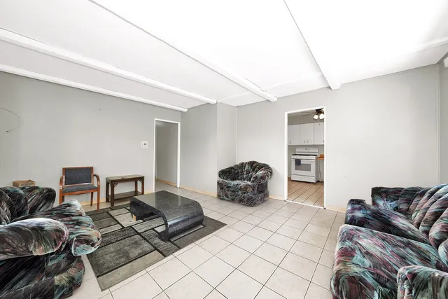 a living room with furniture and a couch