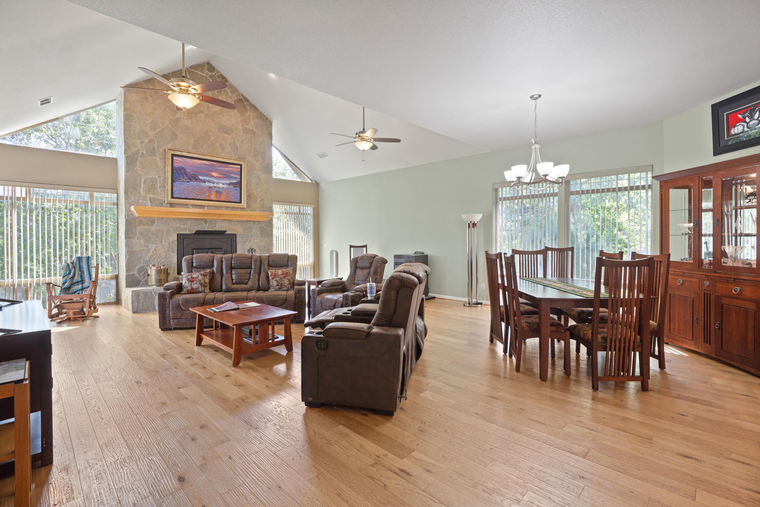 5668 Upper River Road Grants Pass, OR 97526 - Photo 10 of 50 Living room/dining room area has lots of windows for lighting and great forest views