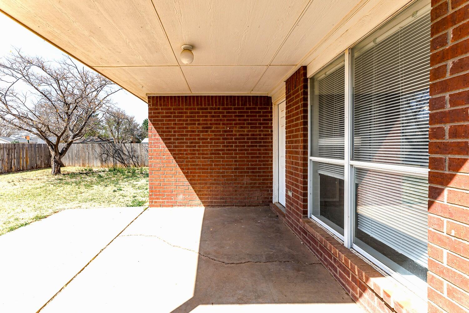 5903 10th Street, Unit 3 Lubbock, TX 79416 - Photo 30 of 32 a view of a pathway both side of building