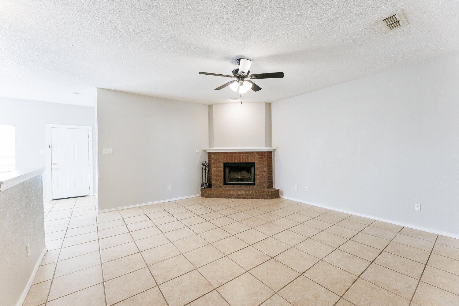 5903 10th Street, Unit 3 Lubbock, TX 79416 - Photo 8 of 32 a view of empty room with fan