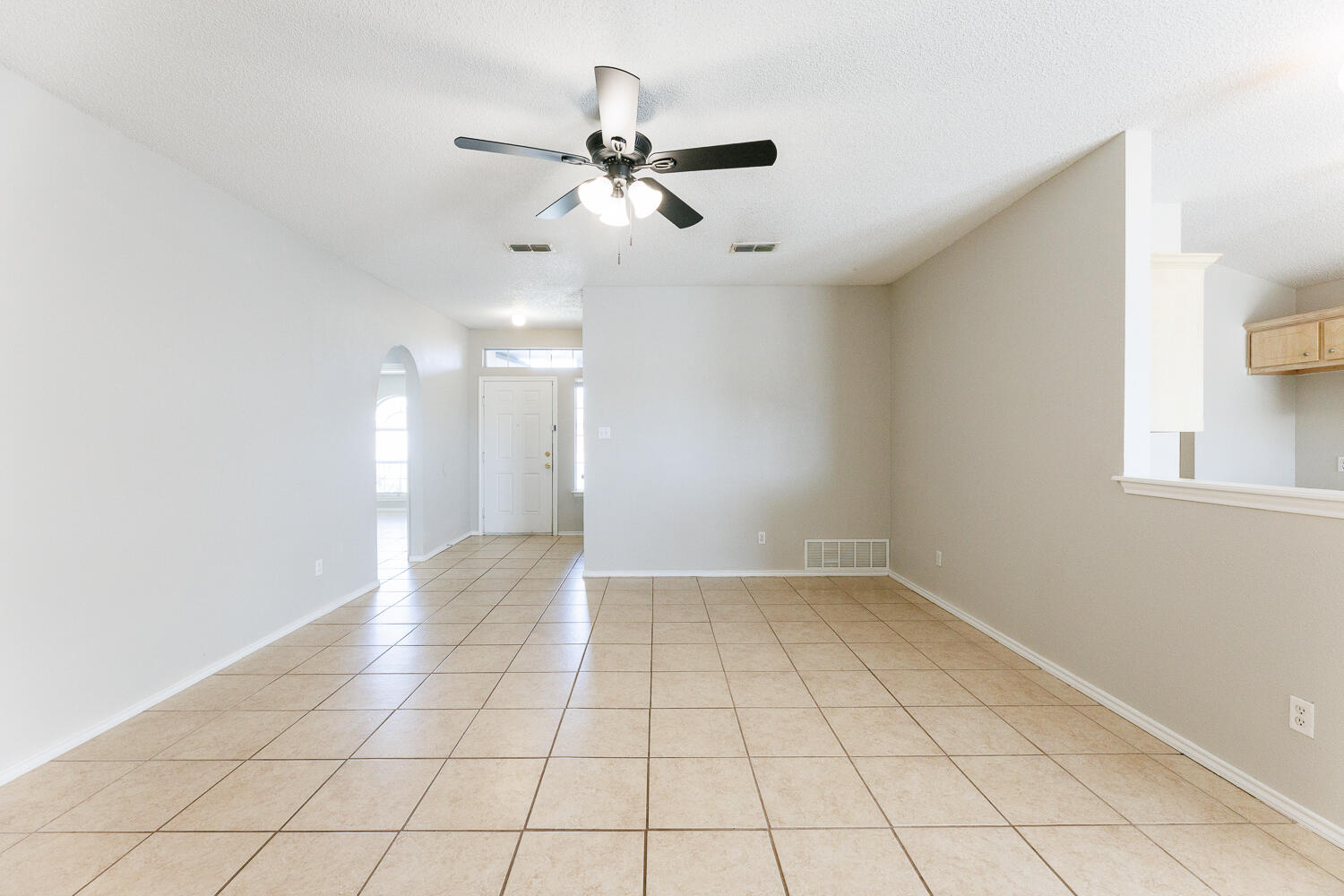 5903 10th Street, Unit 3 Lubbock, TX 79416 - Photo 10 of 32 a view of an empty room with a window