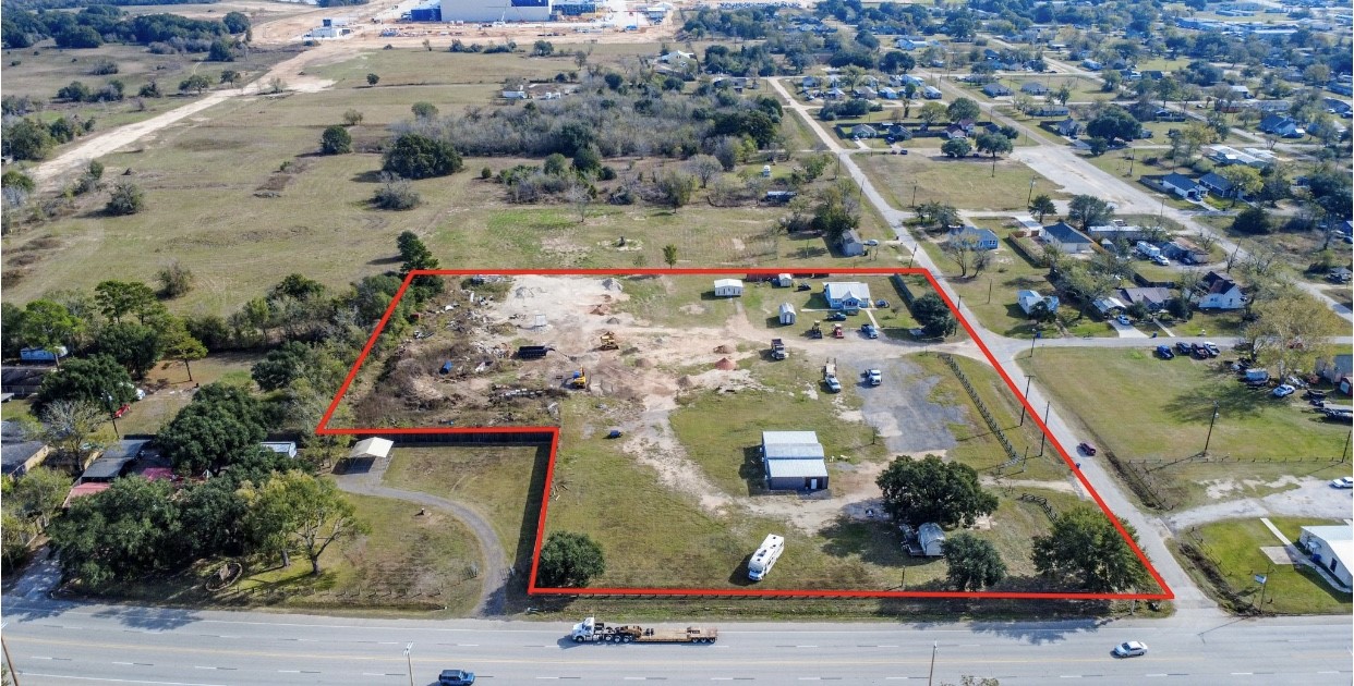 946 St Mary's Street Hempstead, TX 77445 - Photo 17 of 19 an aerial view of residential houses with outdoor space