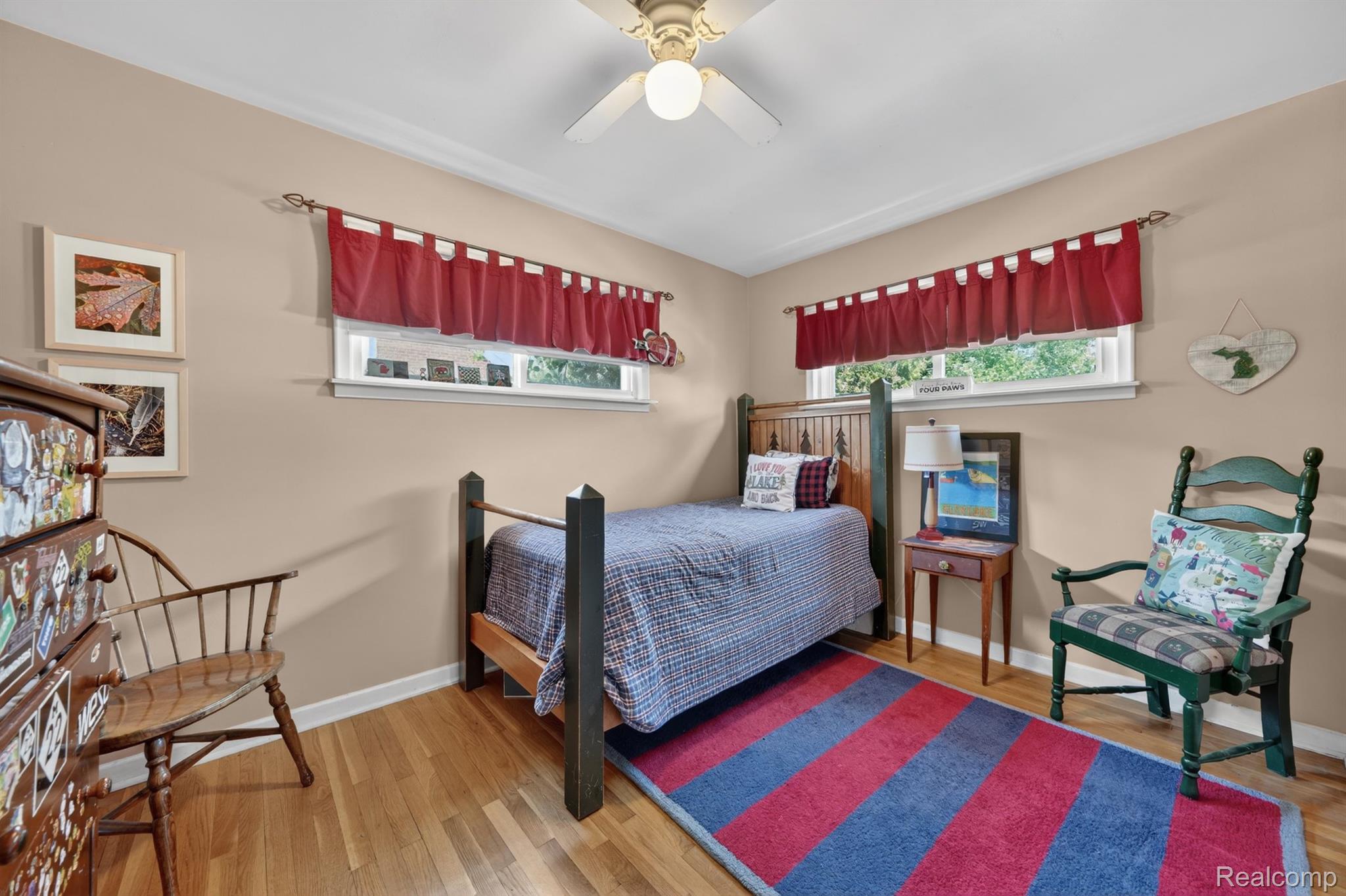 17386 Beverly Road Franklin, MI 48025 - Photo 20 of 28 Hardwood flooring complemented by crown molding and a ceiling fan