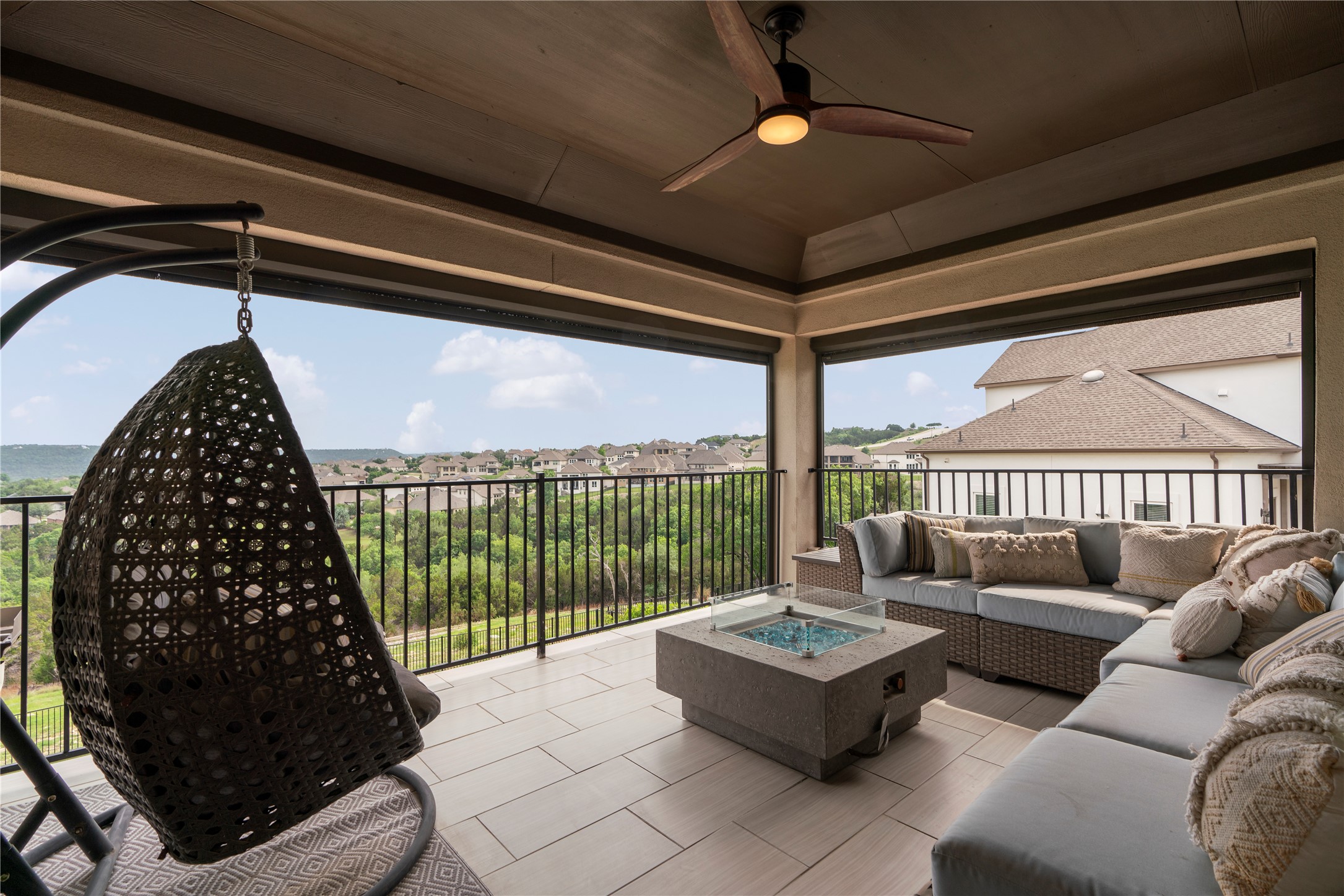 2033 Portobello Road Leander, TX 78641 - Photo 31 of 39 The second-floor balcony includes motor shades and a gas line for a fire pit, ensuring an unparalleled outdoor experience upstairs and leaving no detail overlooked. (Fire pit negotiable)