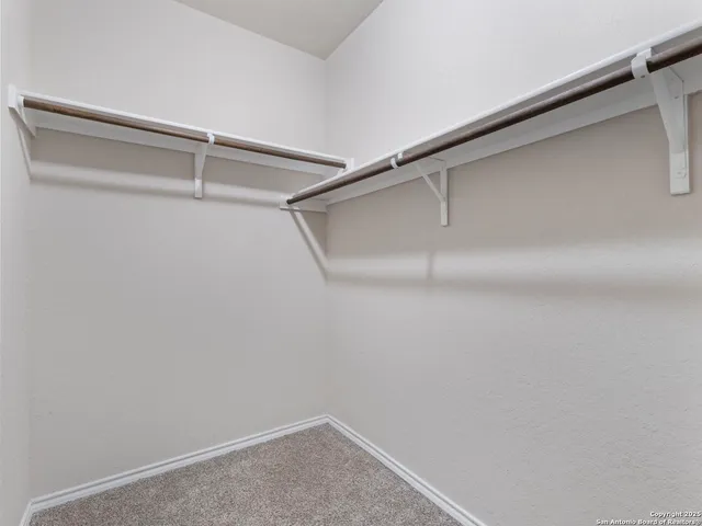 a view of a room with racks on the wall