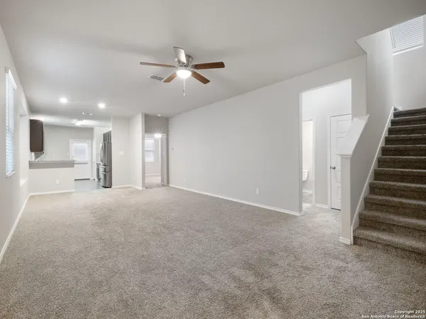 a view of a livingroom with a staircase