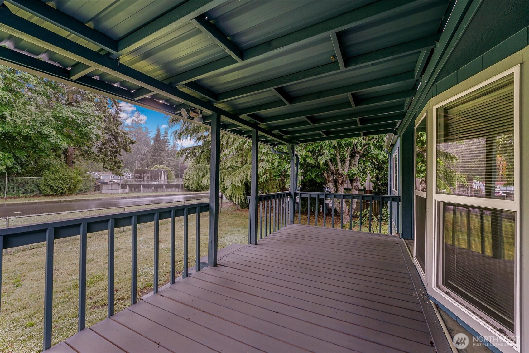 980 South Falcon Road Camano Island, WA 98282 - Photo 24 of 30 a view of a balcony with wooden floor